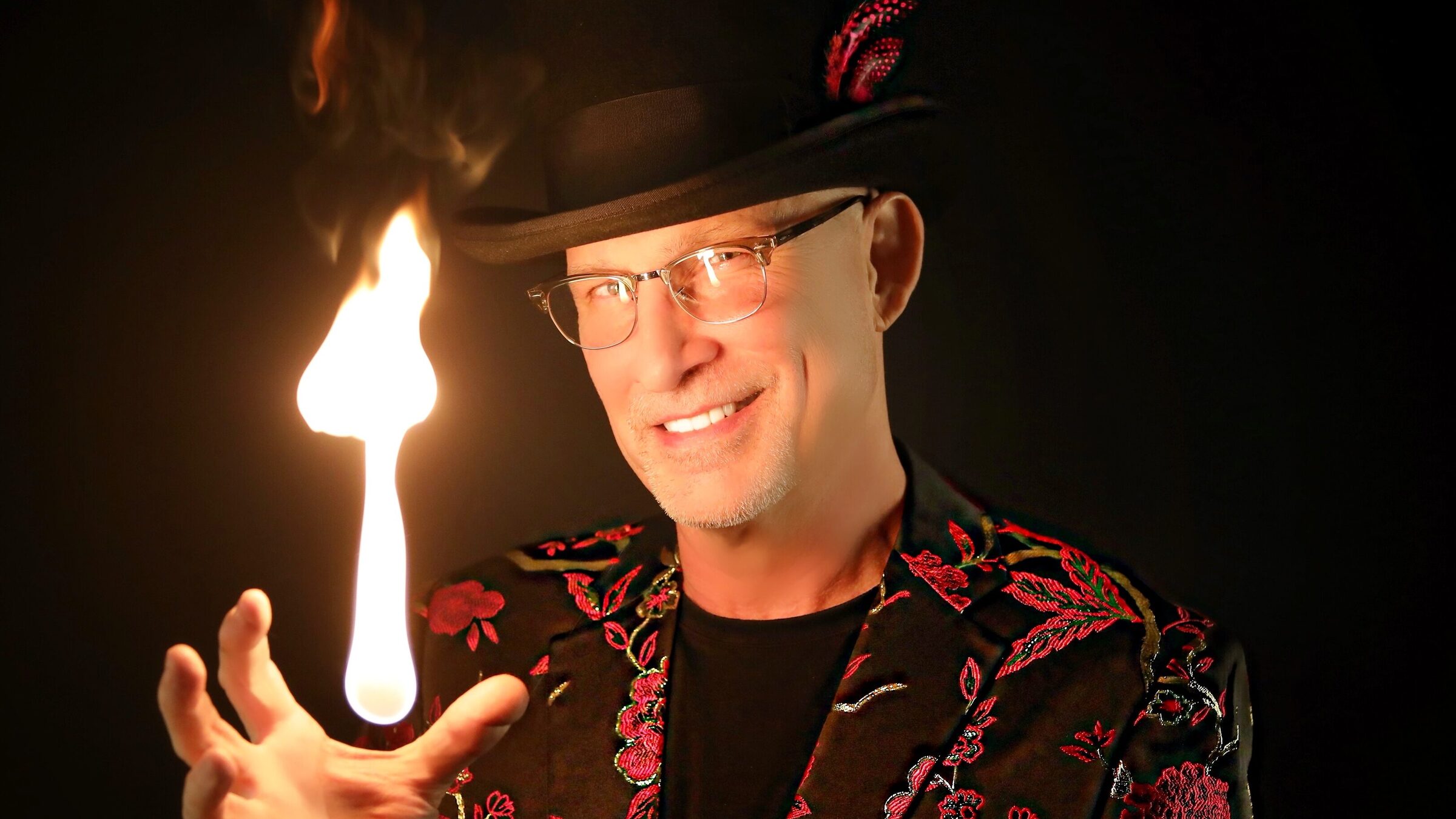 Corporate event magician in Houston — Danger Magic performing a fire effect